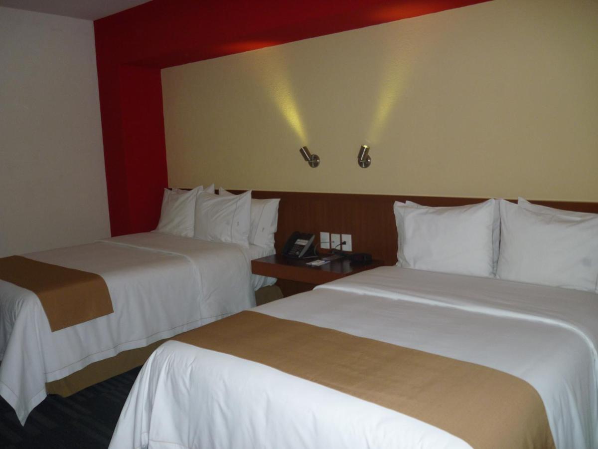فندق غوادالاجارافي  هوليداي إن إكسبريس جوادالاخارا إكسبو الغرفة الصورة